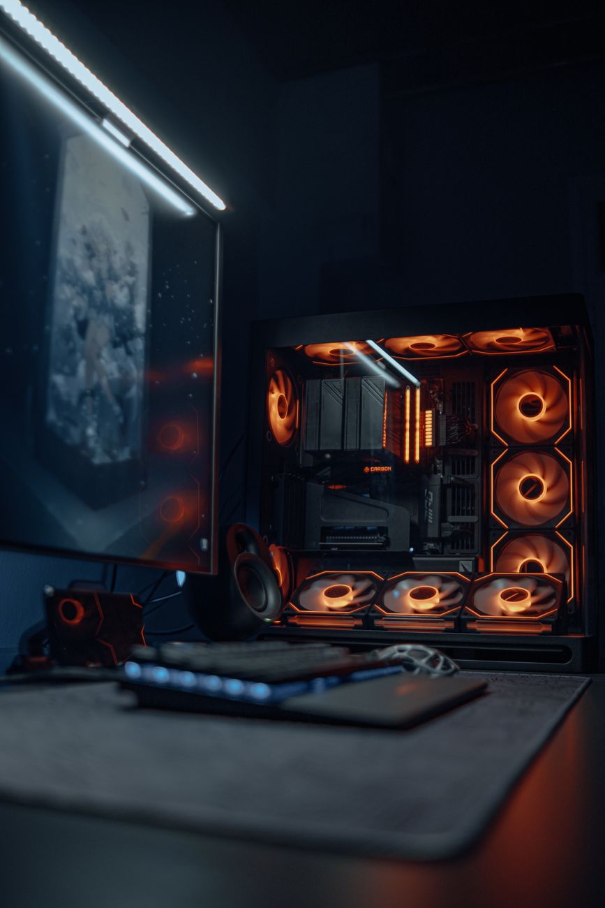 Un joueur de jeu vidéo compétitif assis devant un setup de streaming de niveau professionnel